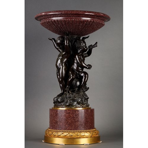 Red porphyry centrepiece with patinated bronze